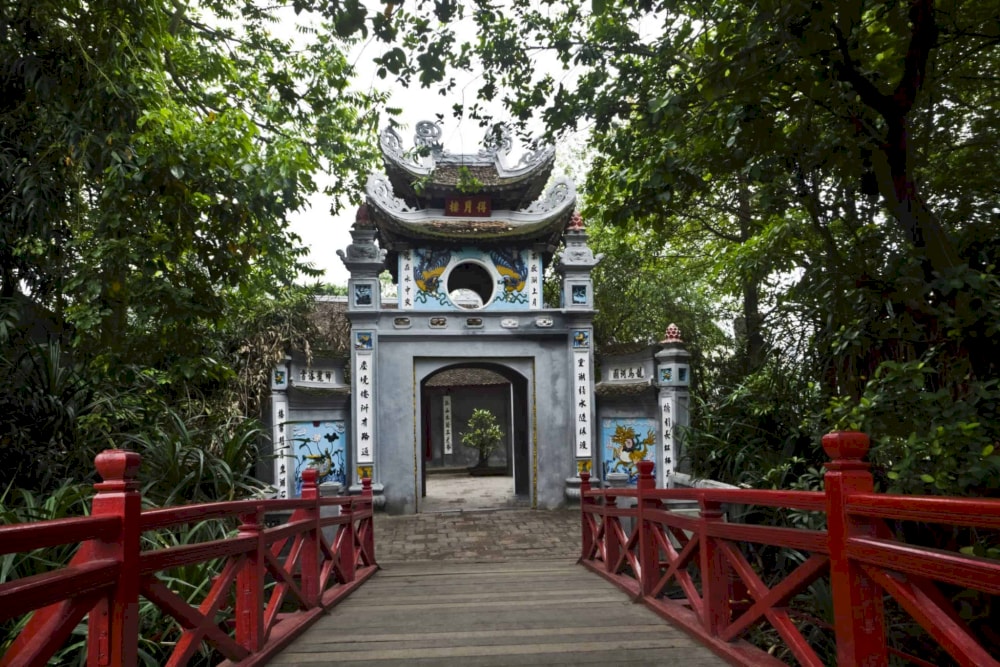 The temple is encircled by ancient trees, which lend a mystical and ancient ambiance